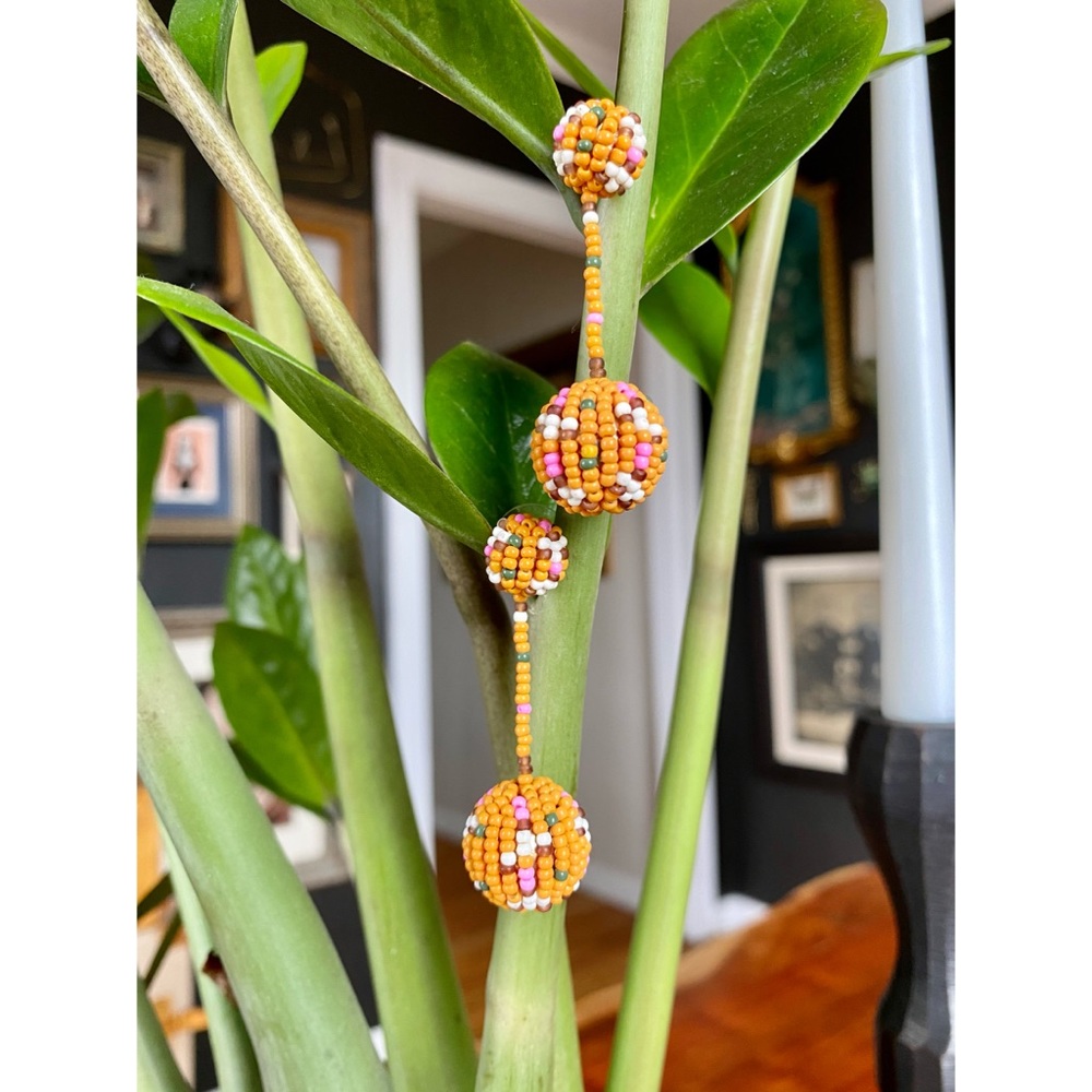 Round drop multicolored beaded earrings.